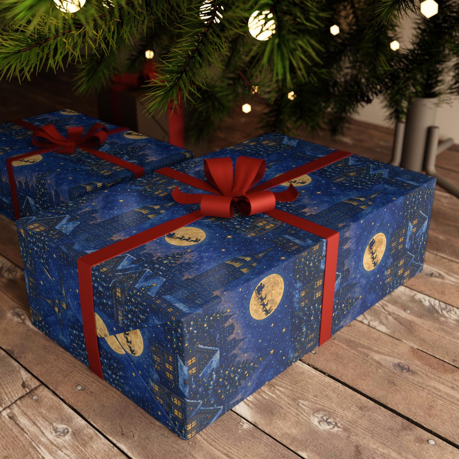 Gifts wrapped in navy Christmas in New York paper with golden moons and red ribbons beneath a Christmas tree